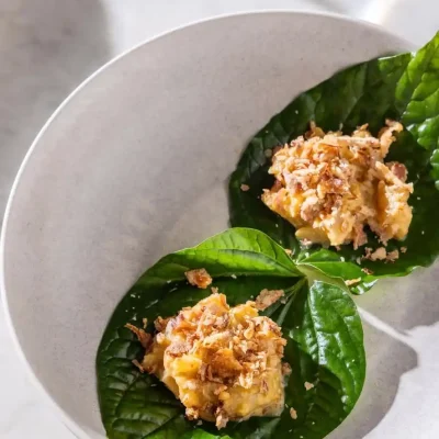Plate of tuna crudo served on betel leaves