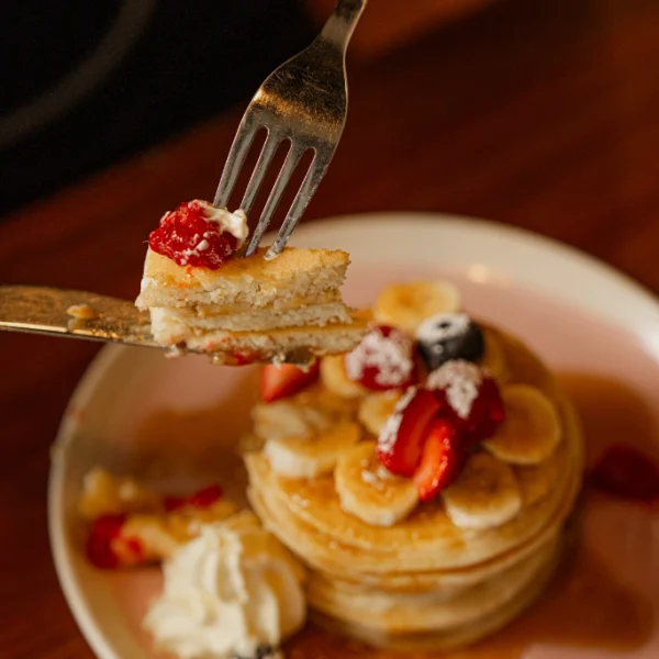 a breakfast pancake stack at love fish restaurant